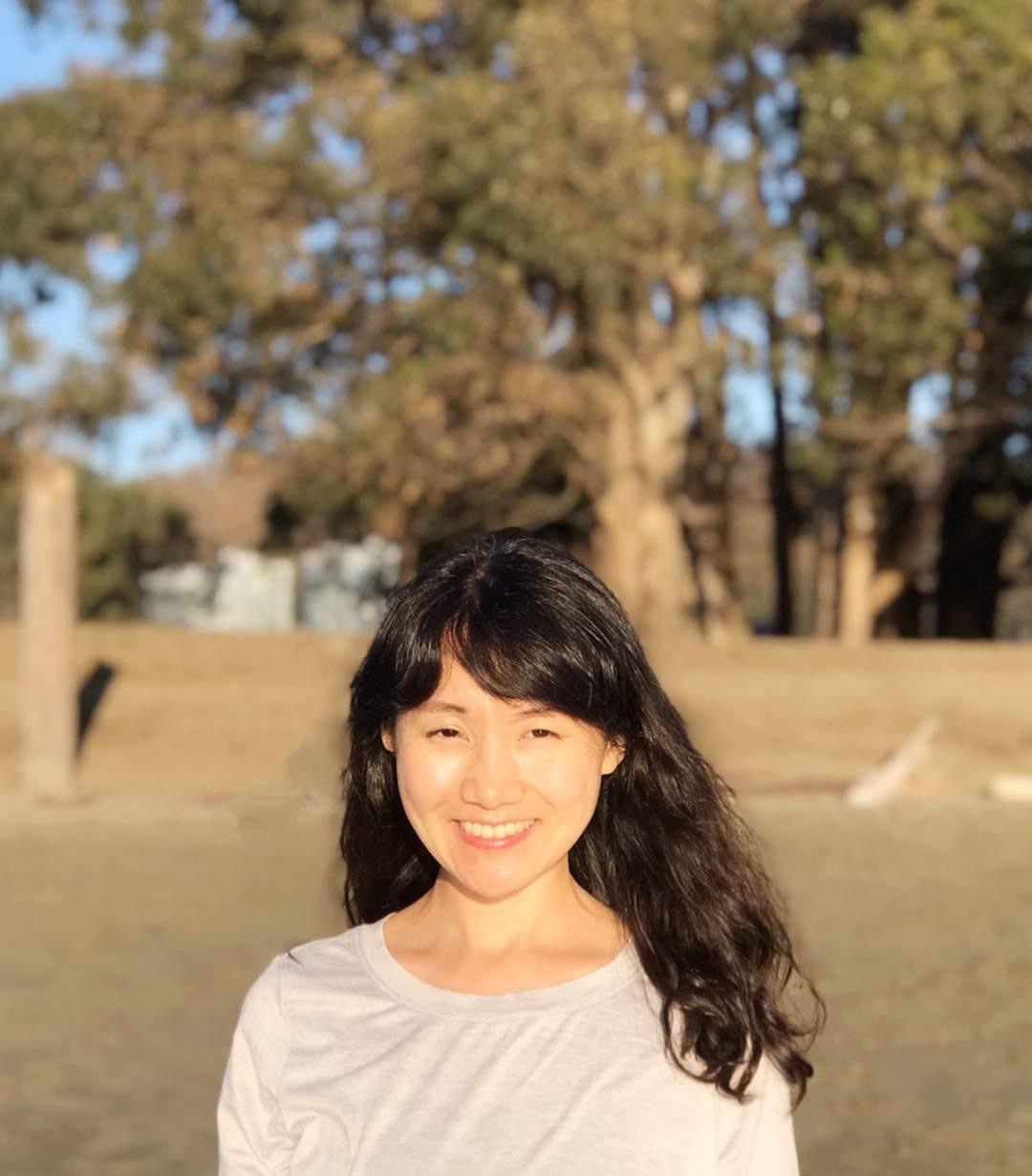 Portrait of a woman outside.