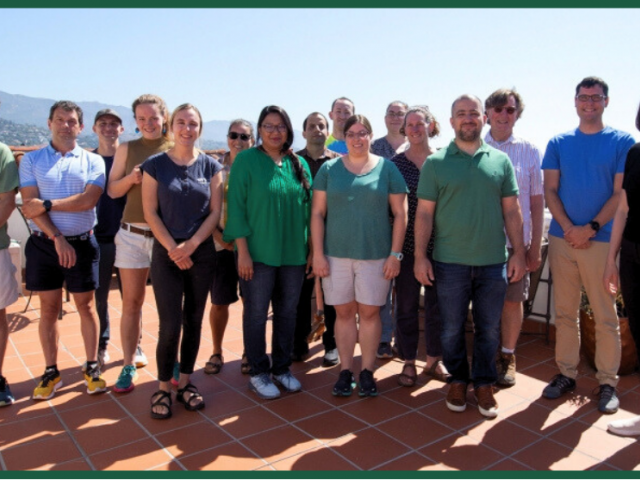 A group of people stand together on the NCEAS terrace.